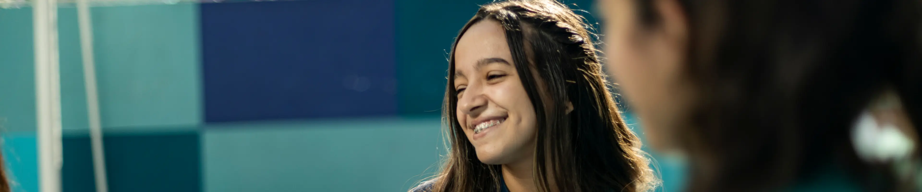 Foto de estudante do Bernoulli sorrindo
